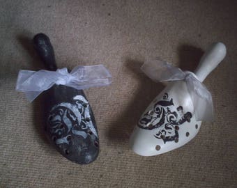 two black and white patina shoe