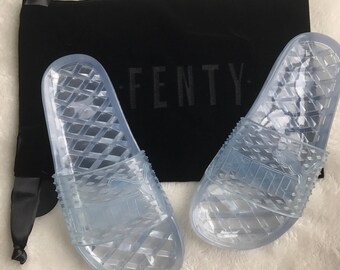 clear puma jelly slides