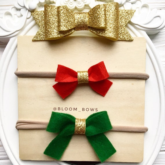 Items similar to Christmas baby bows headband red green gold glitter
