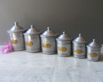 Set of 6 Vintage French Aluminum Canisters,Kitchen Canisters with brass labels.