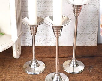 Candlestick trio, vintage silver metal graduated candlesticks
