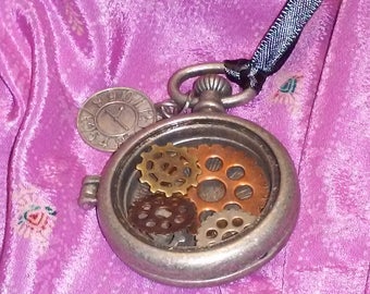 Pocket watch style locket pendant with gears and clock face