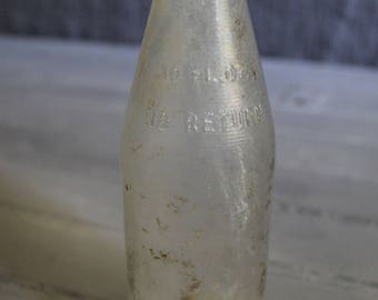 Clear Vintage Soda Bottle
