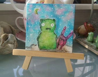 Kuchi kopi glow in the dark watercolor painting (2x2) with stand
