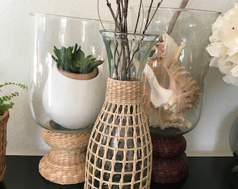 Glass carafe wrapped in straw