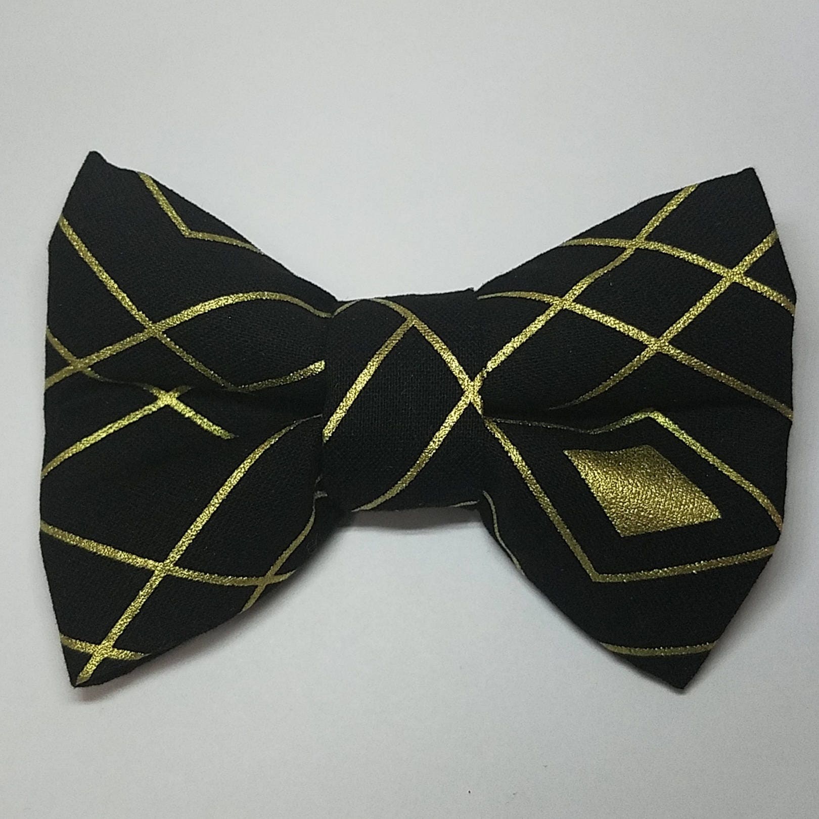 Black and gold geometric bow tie