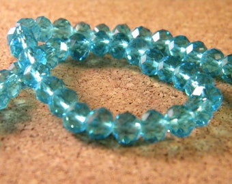 48 silver Austrian Crystal faceted - blue-clear 6 mm x 4 mm - PE74