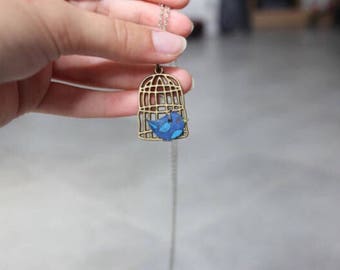 Blue and white birds cage necklaces