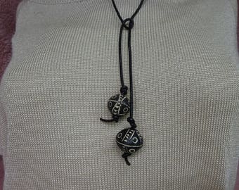 Fired earth and ethnic leather necklace