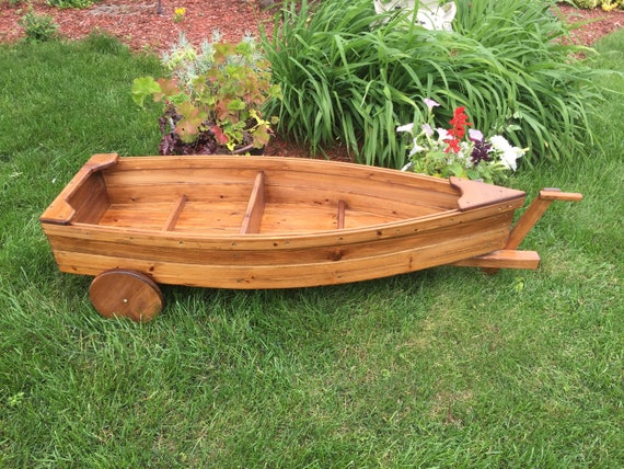 finished nautical all cedar boat and trailer outdoor landscape