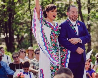 The Beautiful Hand Embroidered Kimono/Tunic Style Mexican Dress with a twist! Our famous beauty just got sexier!!And look at the Groom!!Wow