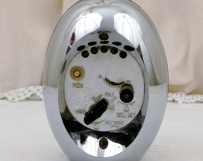 Vintage Working Mid Century 1960s Silver Egg Shaped Mechanical 2 Jewels Wind Up Alarm Clock by Fashion, Japanese Oval Clock with Blue Face