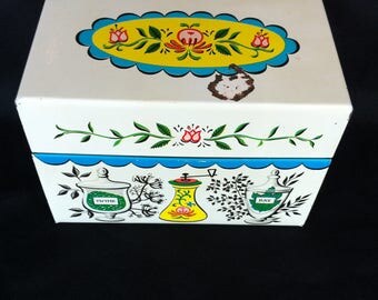 A Chippy Decorative Metal Recipe Box With An Emblem That Reads J. Chen & Co. Made In U.S.A.