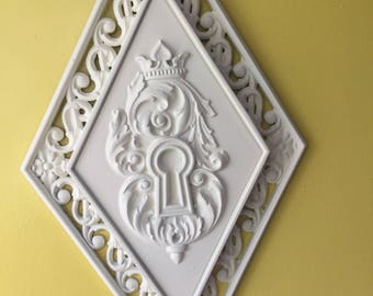 Vintage HomCo Syroco lock wall hanging. Rehabbed metallic