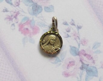 Antique pendant of Saint Thérèse of Lisieux