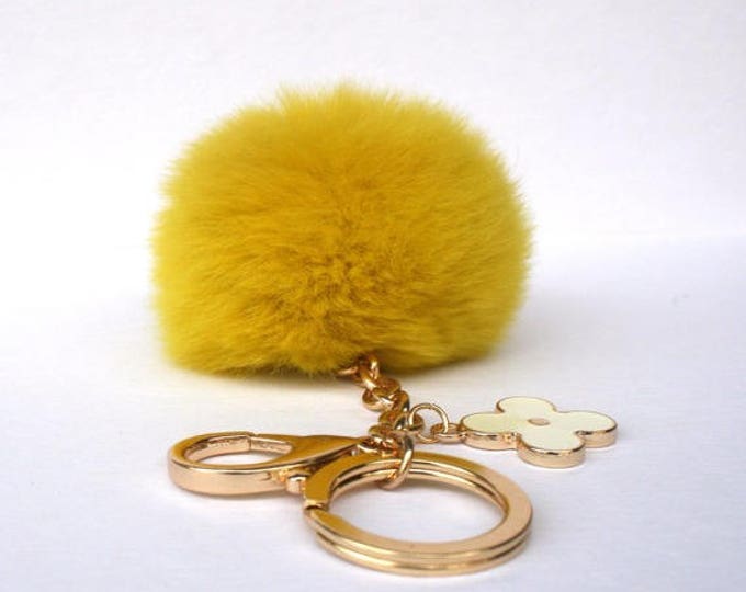 Pom-Perfect Rusty Yellow REX Rabbit fur pom pom ball with black flower keychain