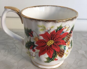 Royal Albert Yultide Bone china mug, red poinsettas and pinecones