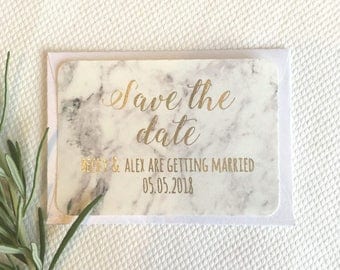 Save the date cards with real foil. Marble effect save the date cards with gold foil. Personalised save the date wedding cards with foil.