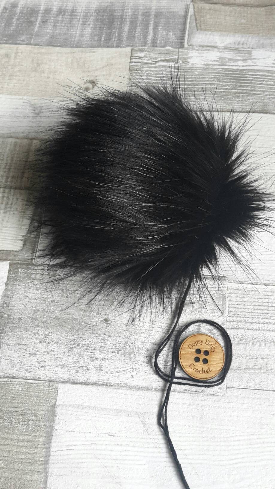 black fur pompom