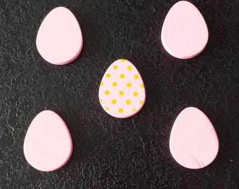 Pink wooden eggs