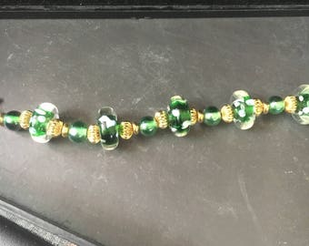Beaded green and gold bracelet