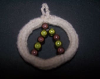 Ornament for Christmas with Brown and green beads
