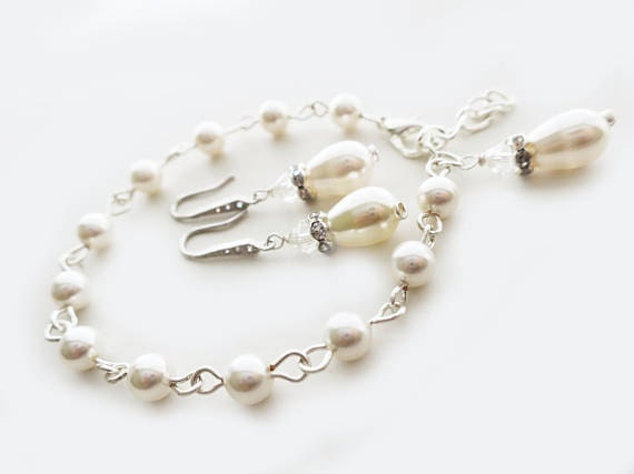 Pearl and crystal bridal jewelry set, cubic zirconia wedding bracelet and earrings