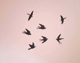 Six stickers in the shape of black birds