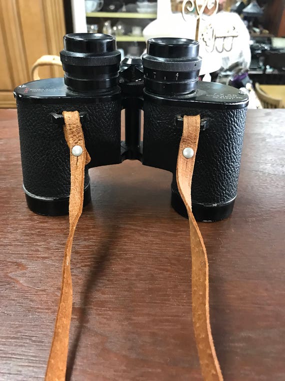 Vintage binoculars in leather case