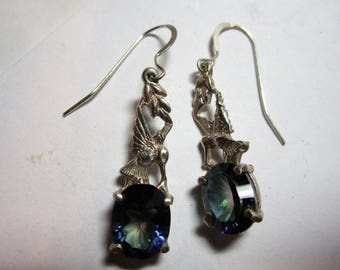 Ladies hummingbird dangle sterling earrings with mystic blue topaz