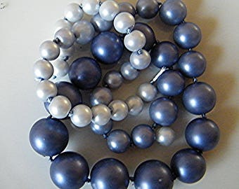 Mixed gradient 14 8 mm blue glass beads sold by