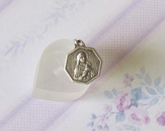 Antique pendant of Saint Thérèse of Lisieux