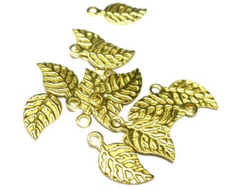 Set of 20 leaf shaped charms, in golden brass, 13 * 6 mm