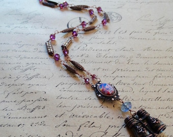 Long Binocular necklace, Rusted Iron pewter Binoculars, man-made fire Opal, rhinestone bars, argyle beads, floral bars, Amethyst swarovski.