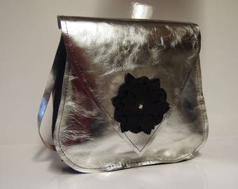 Silver colored leather shoulder bag.
