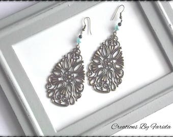 These bronze Teardrop filigree earrings and blue/black beads