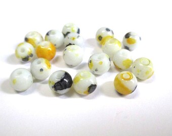 20 speckled yellow and black 6mm white glass beads