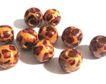 10 wooden beads with ethnic pattern 16 x 15 mm