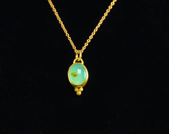 Peruvian opal pendant in high karat gold