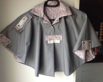Pearl gray cape and liberty-style flowery interio
