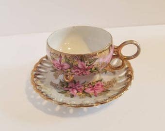 Royal Halsey Very Fine 3 footed teacup and saucer.
