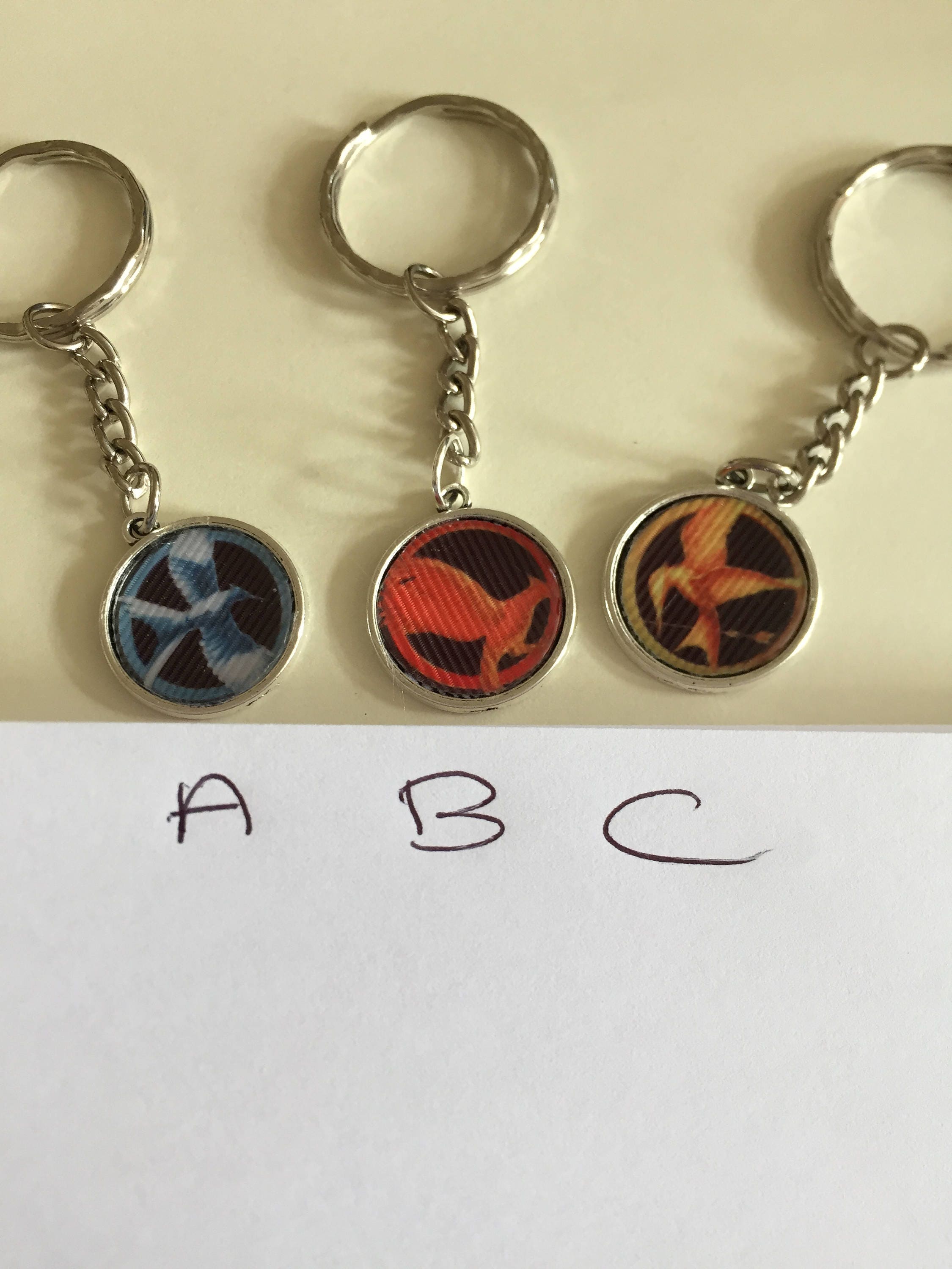 The Hunger Games keyring The Hunger Games Keychain item 669