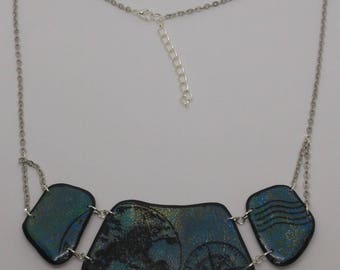 Polymer clay blue bib travel