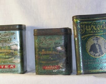 Lot of three advertising tins