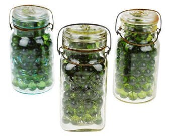 Early Mason Type Jars filled with old Green Glass Ingots