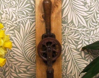 Vintage Carpenters hand drill mounted.