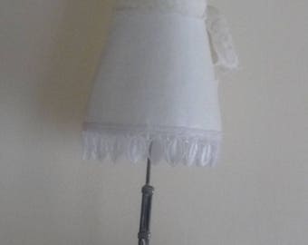 Small white decorative sewing mannequin