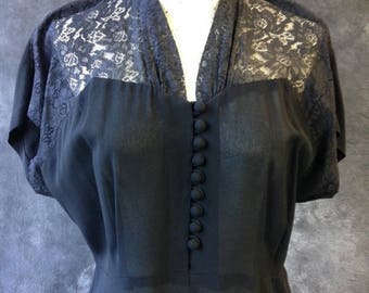 ON SALE 50's black rayon dress with lace shoulders. Large, Extra Large.
