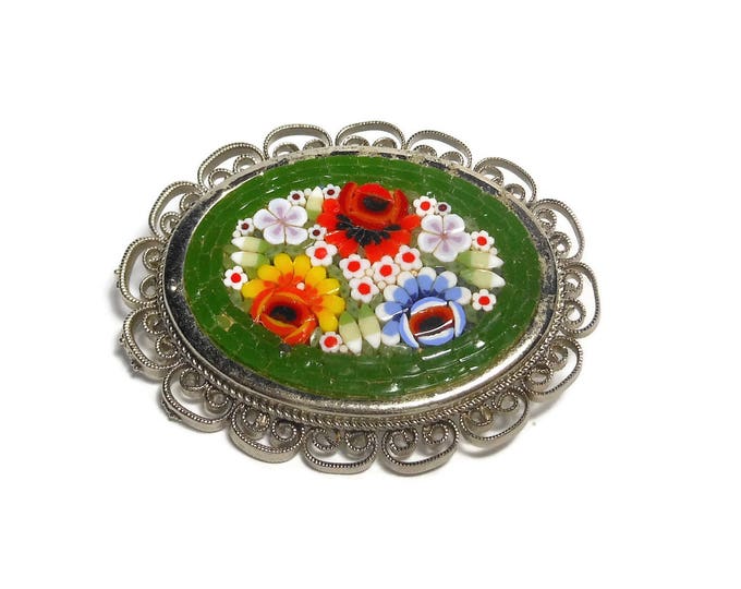 Small mosaic brooch pin, miniature glass mosaic floral, Murano glass, mid century, open scroll work oval frame, green red orange blue