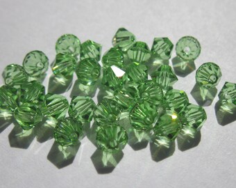 30 genuine swarovski 4mm - peridot AB Crystal bicones (47)